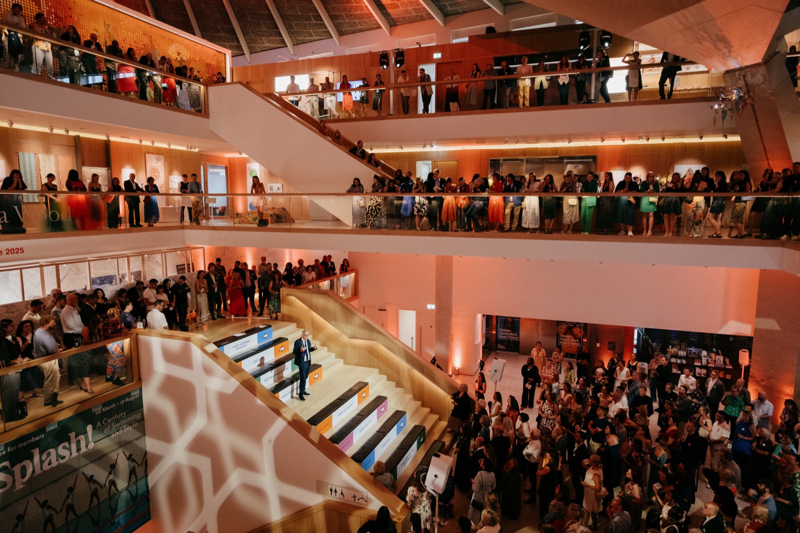 The Design Museum atrium filled with guests across every level at Penguin's 90th anniversary party